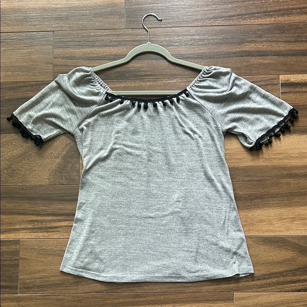 Woman’s Pom Pom top